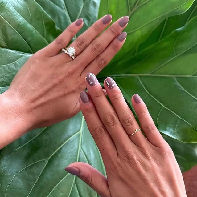 14. Mauve Taupe Almond Nails with Subtle Art Accents - taupe nail ideas