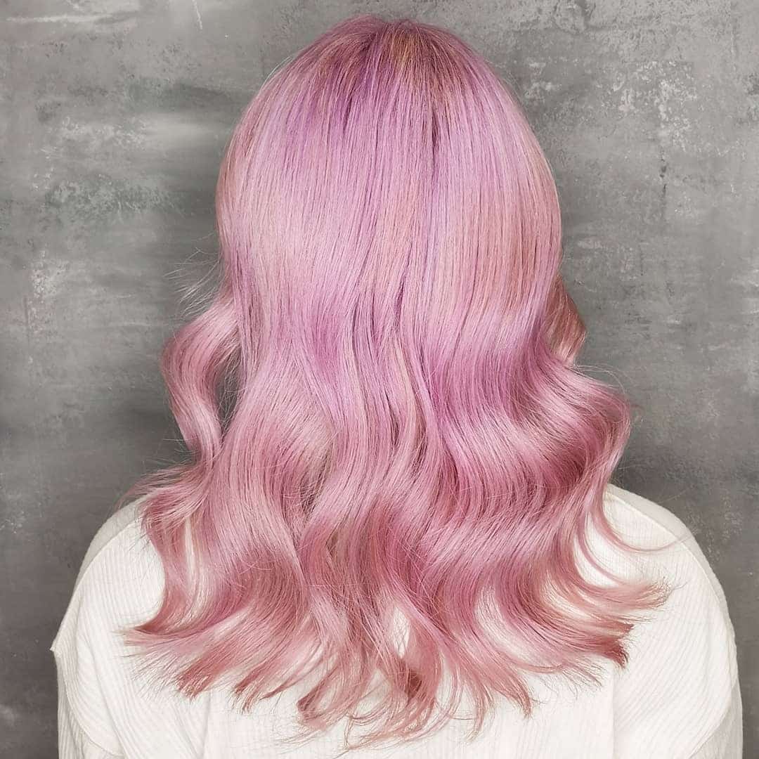 4. Glossy Rose Pink Soft Waves - Pastel Pink Hair Color