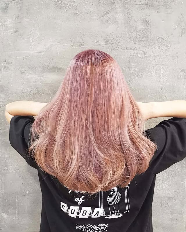 6. Feathered Pastel Pink Layered Cut - Pastel Pink Hair Color