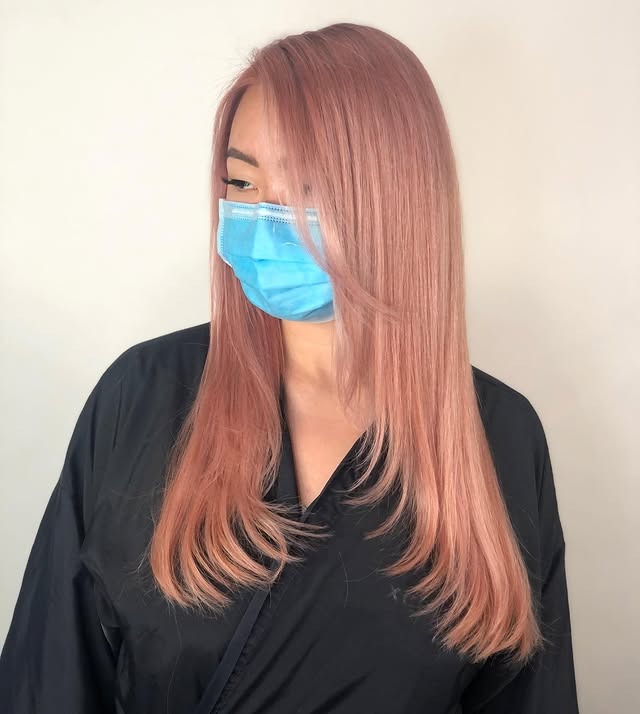 14. Sleek Layered Rose Gold Pink - Pastel Pink Hair Color