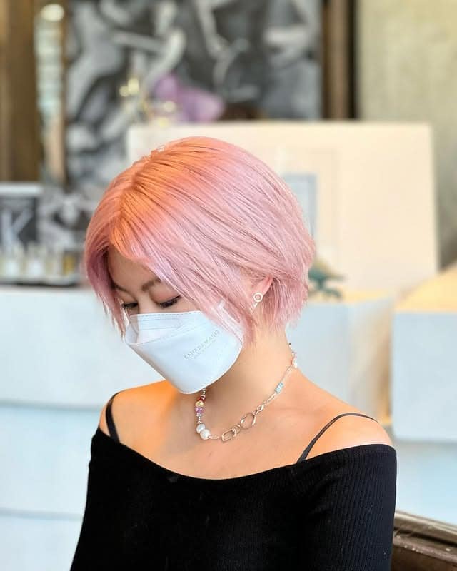 17. Tousled Blush Pink French Bob - Pastel Pink Hair Color