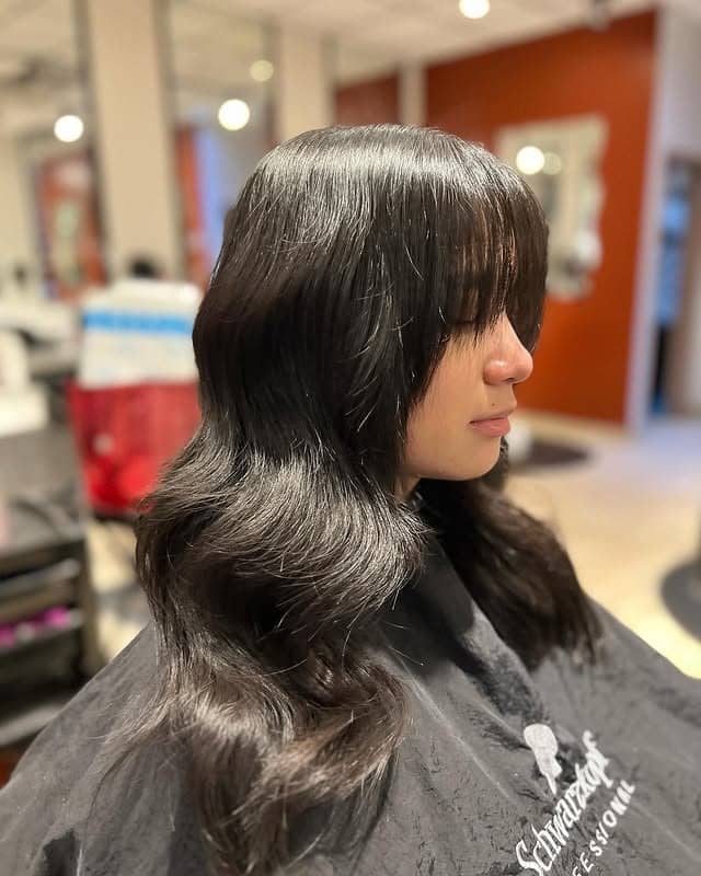 6. Long Layered Cut with Face-Framing Fringe in Natural Black - Wispy Layered Haircuts