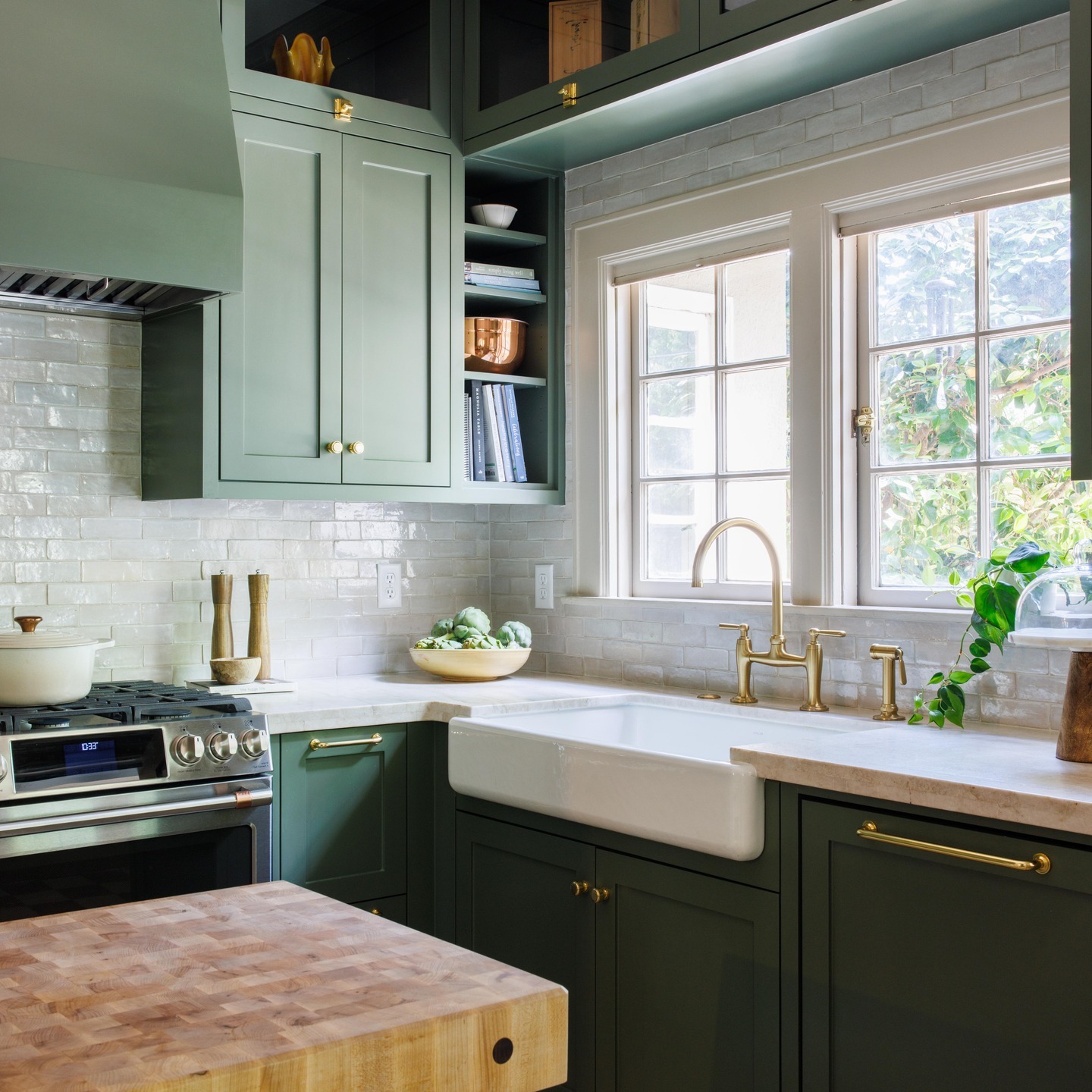 15. Soft Olive Green Kitchen with Farmhouse Sink Detail - olive green kitchen ideas