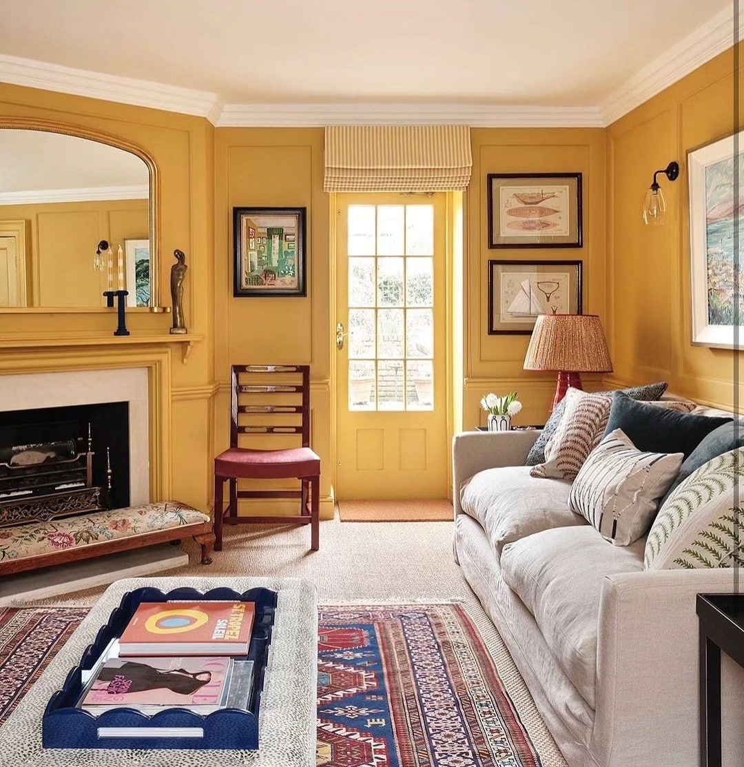 3. Cozy Golden Yellow Living Room with Traditional Details - yellow living room ideas