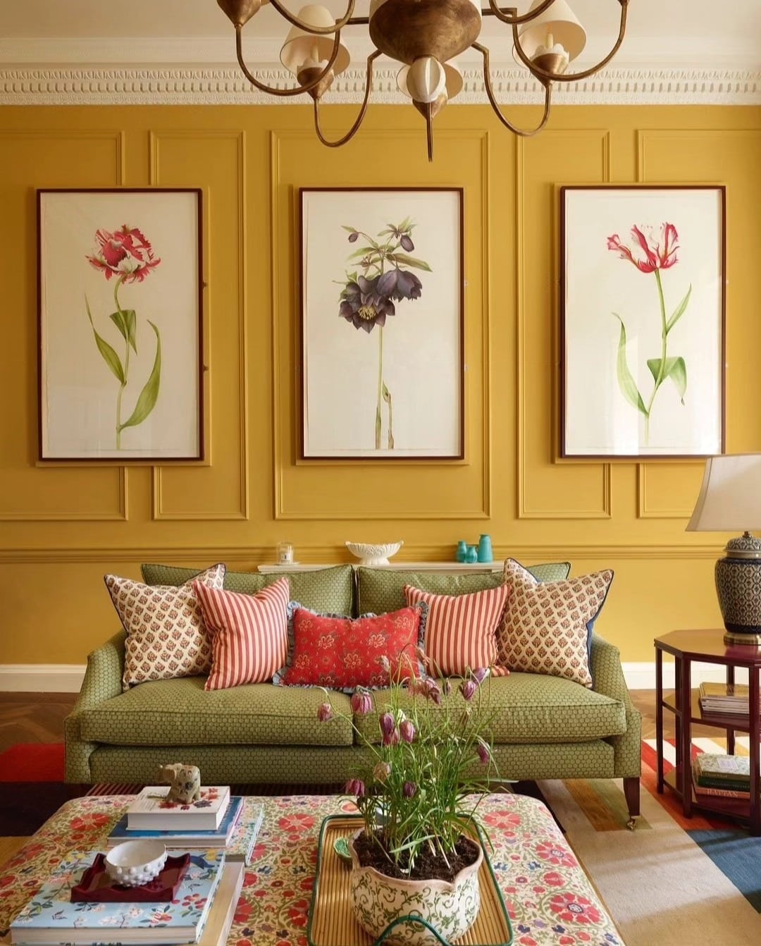 11. Classic Panelled Yellow Walls with Botanical Art Display - yellow living room ideas