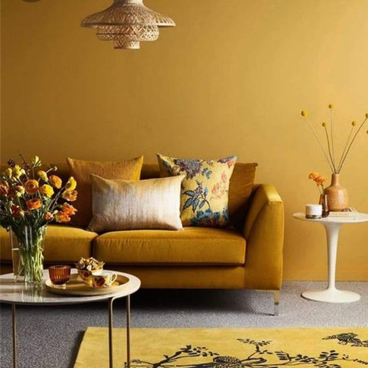 14. Monochromatic Mustard Yellow with Warm Layering - yellow living room ideas
