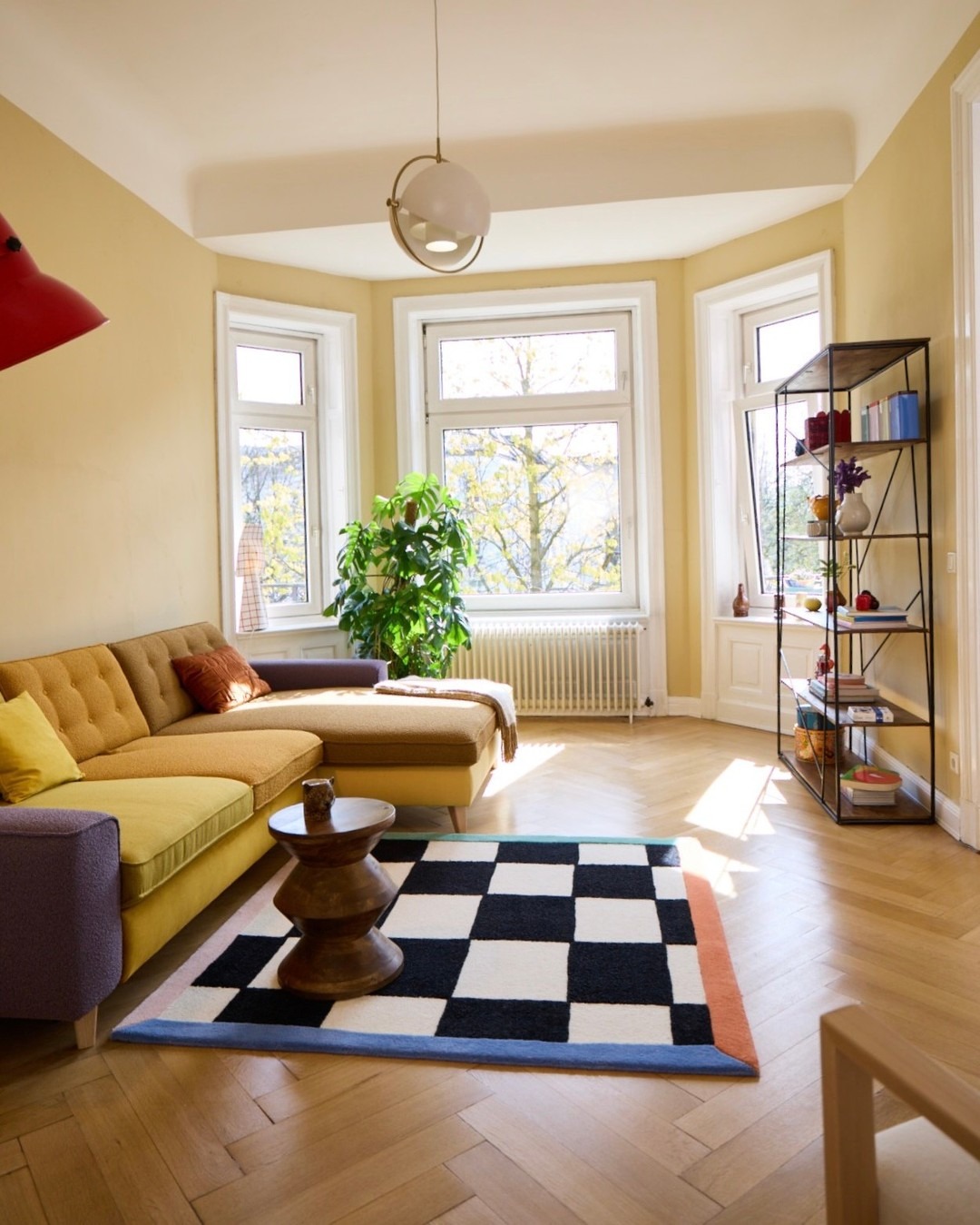 20. Soft Yellow Living Room with Natural Light Emphasis - yellow living room ideas
