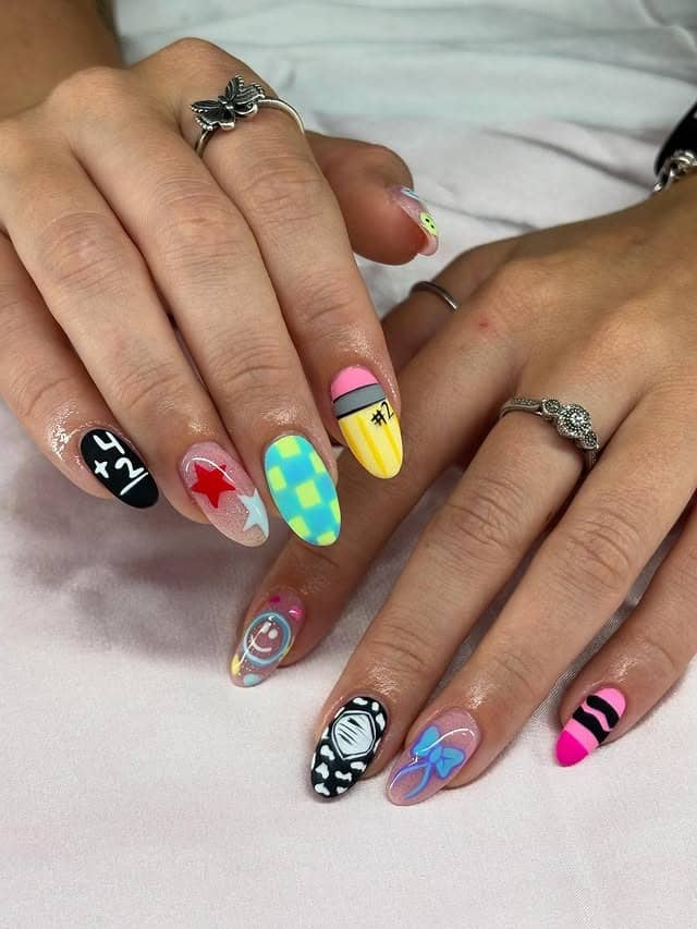 3. Whimsical Chalkboard & Classroom Icon Nails in Multicolor - teacher nail ideas