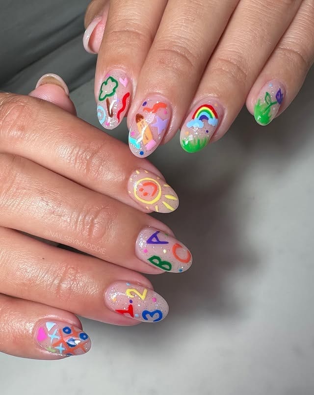5. Pastel Learning Doodle Nails with Rainbow and Numbers - teacher nail ideas