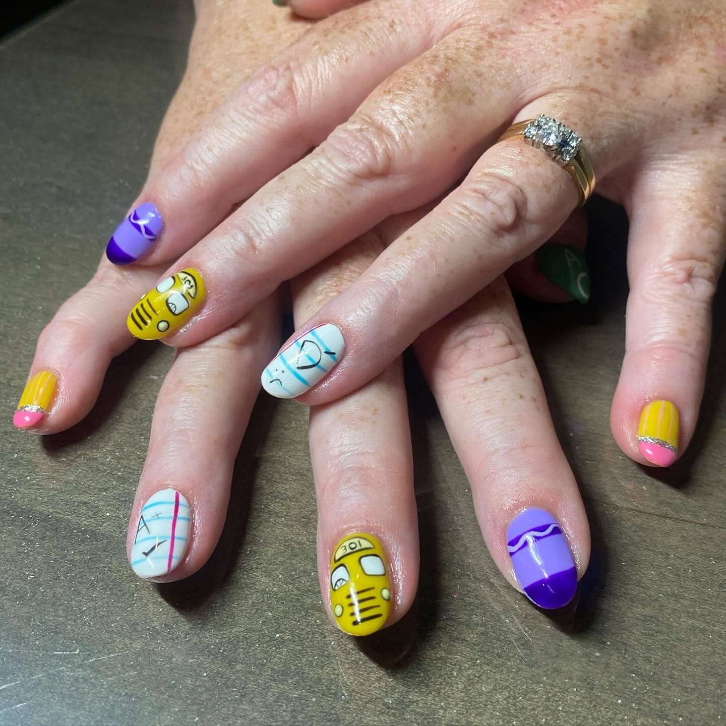 11. School Bus & Notebook Accent Nails in Yellow, Purple, and White - teacher nail ideas