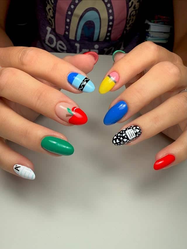 16. Primary Color Mix Nails with Apple and Graphic Accents - teacher nail ideas