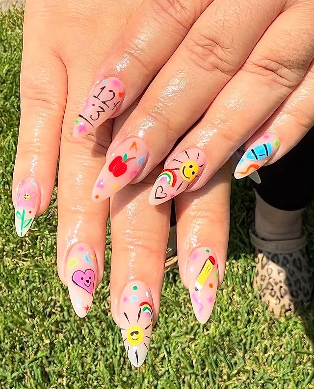 22. Whimsical Teacher Doodle Almond Nails in Nude with Multicolor Art - teacher nail ideas
