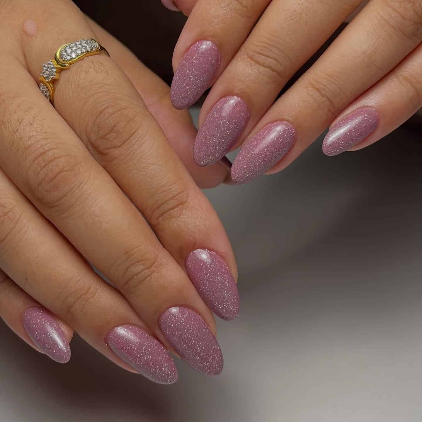8. Dusty Rose Shimmer Almond Nails - violet nail ideas