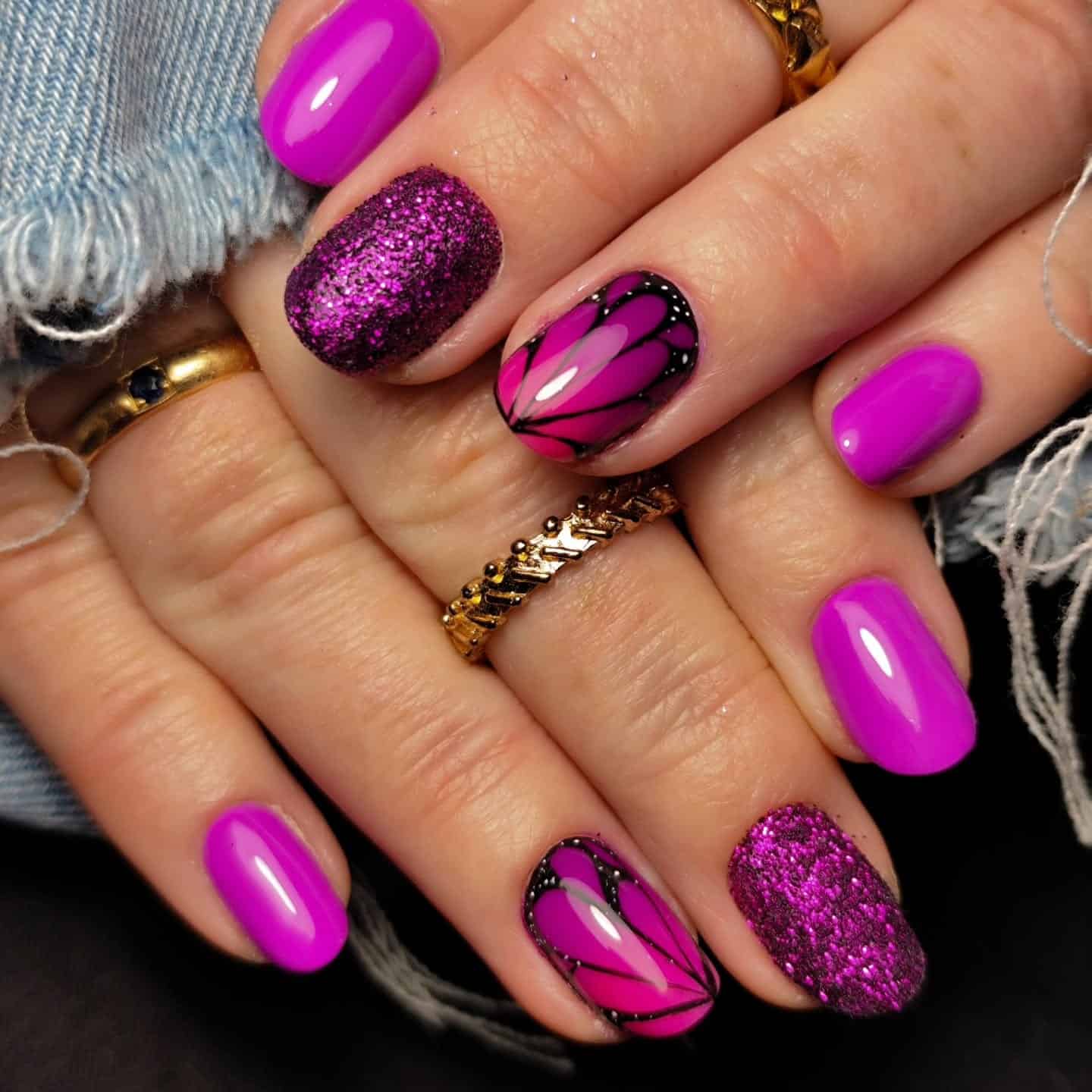 11. Vibrant Fuchsia Oval Nails with Butterfly Accent Art - violet nail ideas