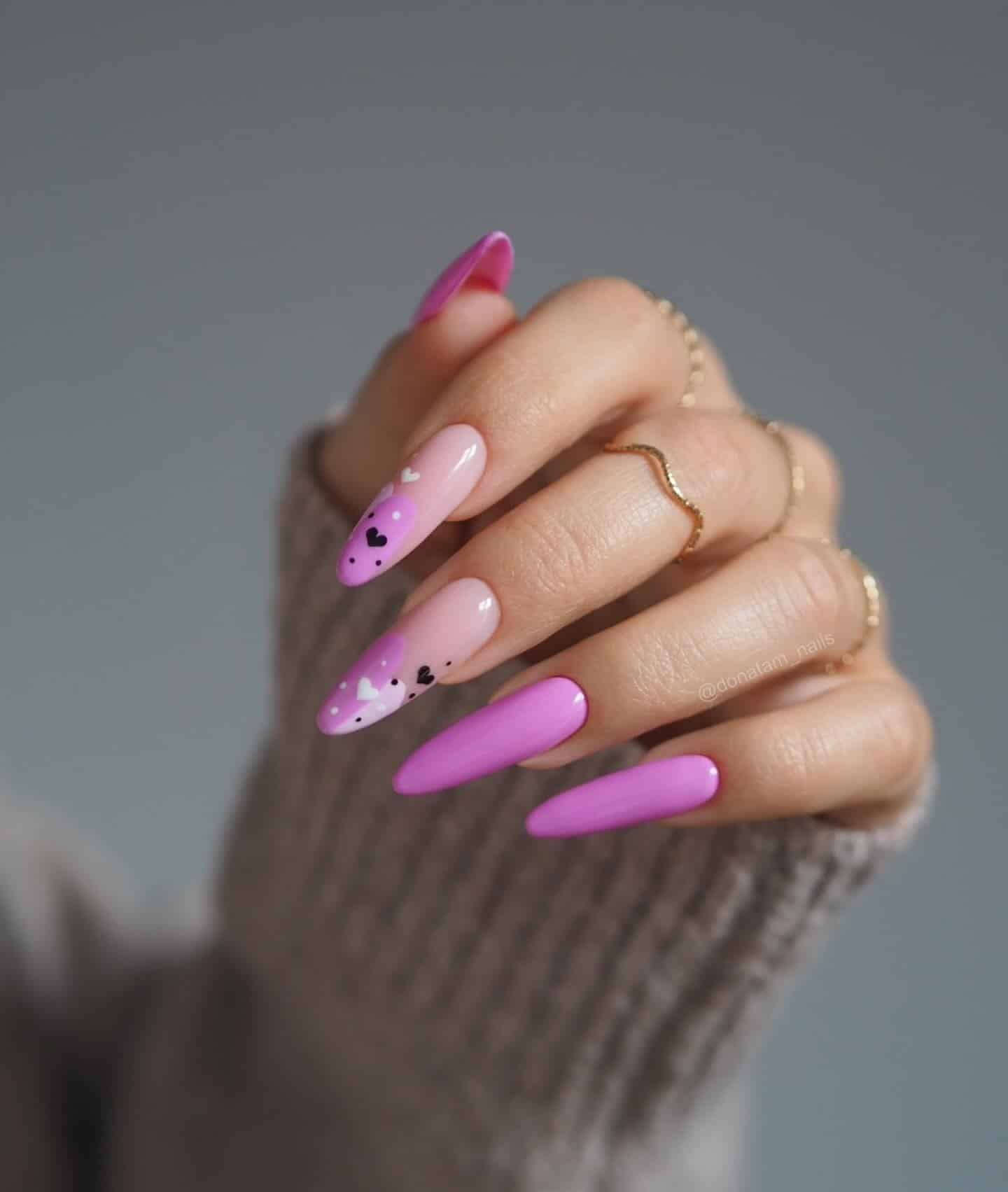 16. Pink-Violet Stiletto Nails with Heart Detail - violet nail ideas