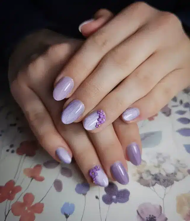 20. Soft Lavender Pearl Nails with Floral Embellishments - violet nail ideas