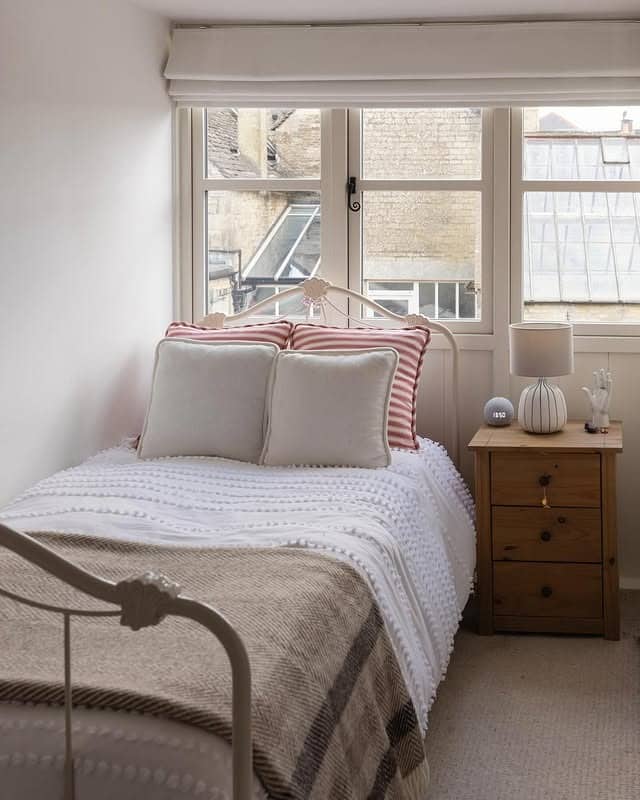 4. Classic Small Bedroom with Subtle Pattern Play - small bedroom ideas