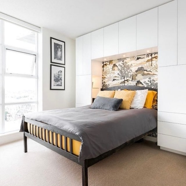 10. Built-In Storage Bed Nook with Accent Back Panel - small bedroom ideas