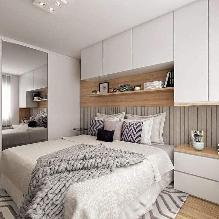 11. Built-In Storage Bedroom in Soft Gray and Wood Tones - small bedroom ideas