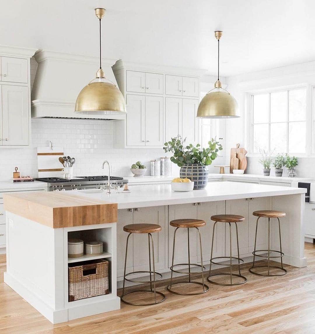 18. Bright White Kitchen with Warm Wood Accents - beautiful kitchen ideas