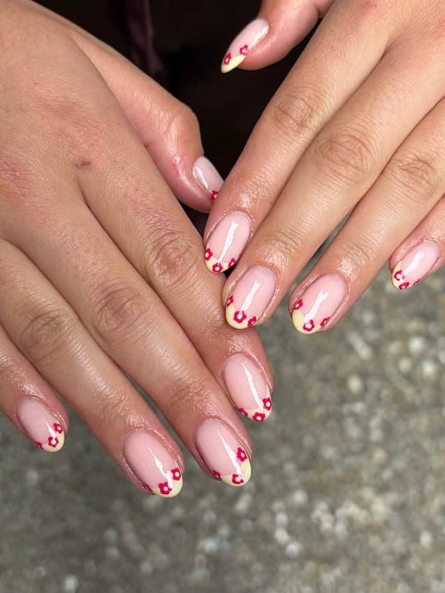 2. Micro Floral French Tips in Sheer Nude and Red - nail ideas for short nails