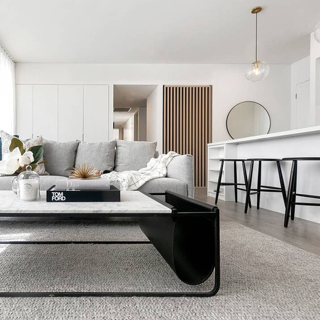 2. Soft Grey Minimal Living with Black Accents - grey and black living room ideas