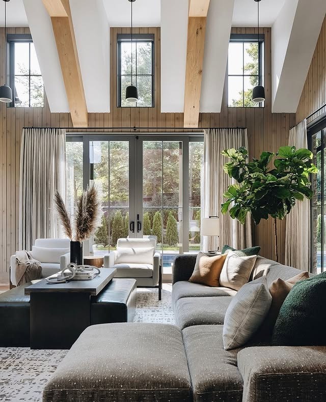 5. Warm Grey Living with Natural Wood and Black Details - grey and black living room ideas