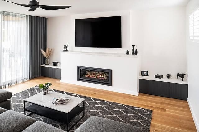 6. Crisp Grey and Black Fireplace Feature - grey and black living room ideas