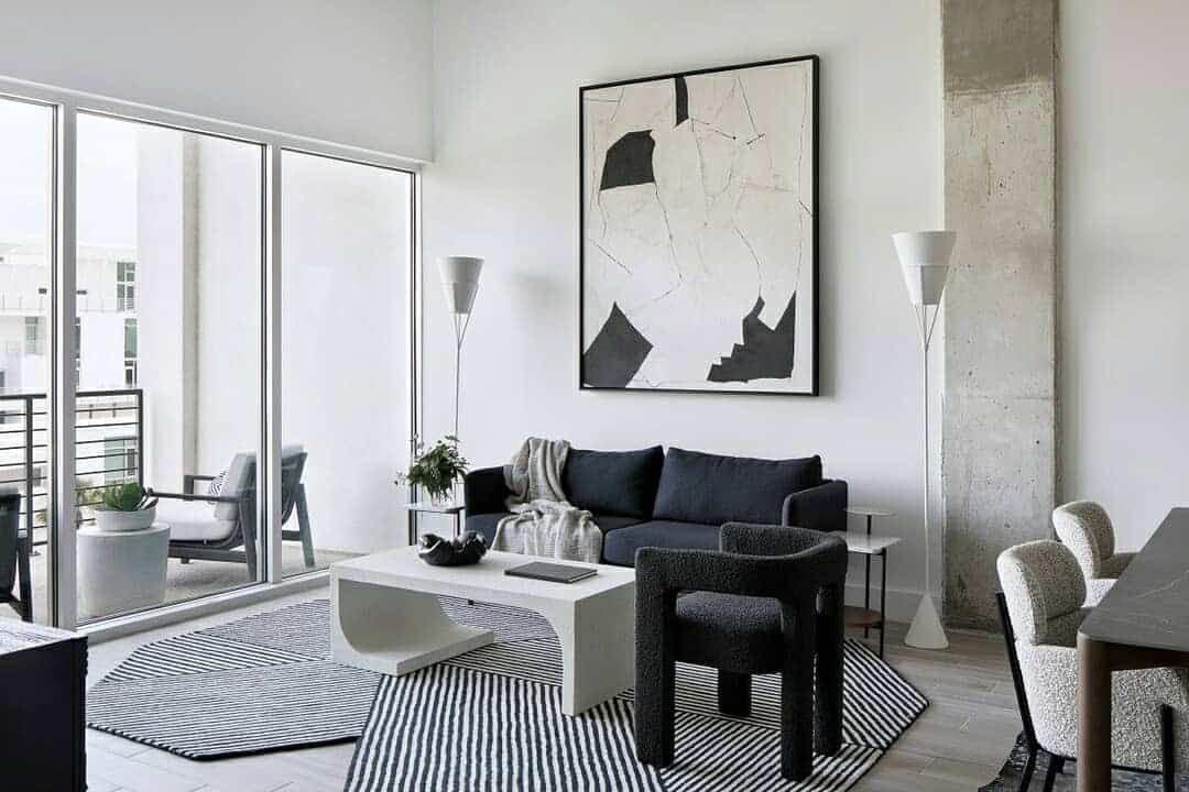 9. Monochrome Grey and Black Urban Living Space - grey and black living room ideas