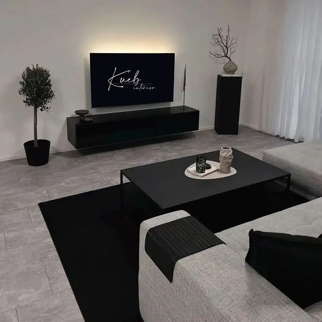 21. Minimal Grey Living Room with Floating Black Media Unit - grey and black living room ideas