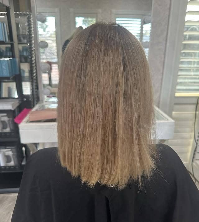 8. Center-Parted Blunt Lob with Bright Platinum Blonde - Short Blunt Cut