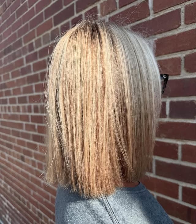 11. Precision Blunt Lob with Buttery Blonde Highlights - Short Blunt Cut