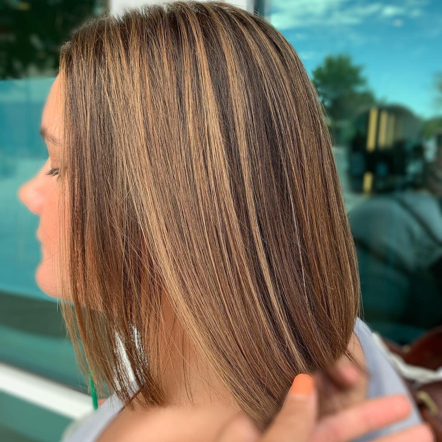 12. Sleek Blunt Bob with Caramel Ribbon Highlights - Short Blunt Cut