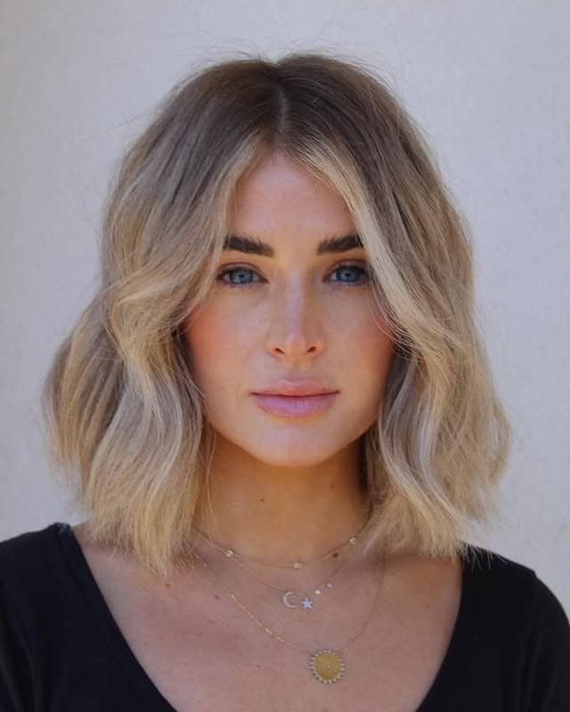 21. Soft Wavy Blunt Bob with Creamy Blonde Balayage - Short Blunt Cut