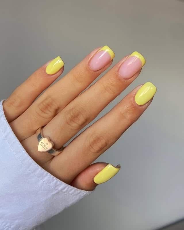 7. Minimal Pastel Yellow French Tip Nails - pastel yellow nail ideas