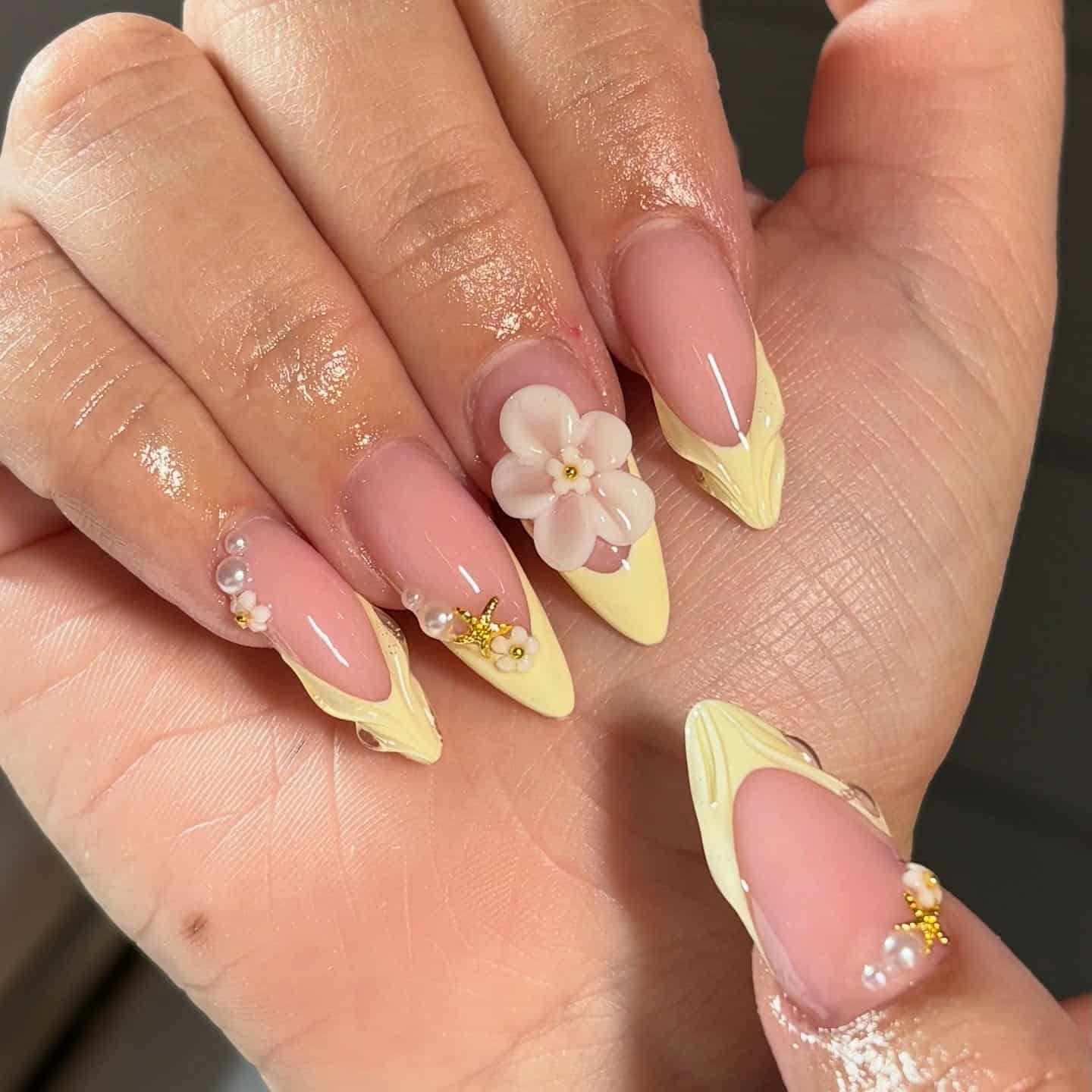 13. Sculpted Pastel Yellow French Tip Floral Nails - pastel yellow nail ideas