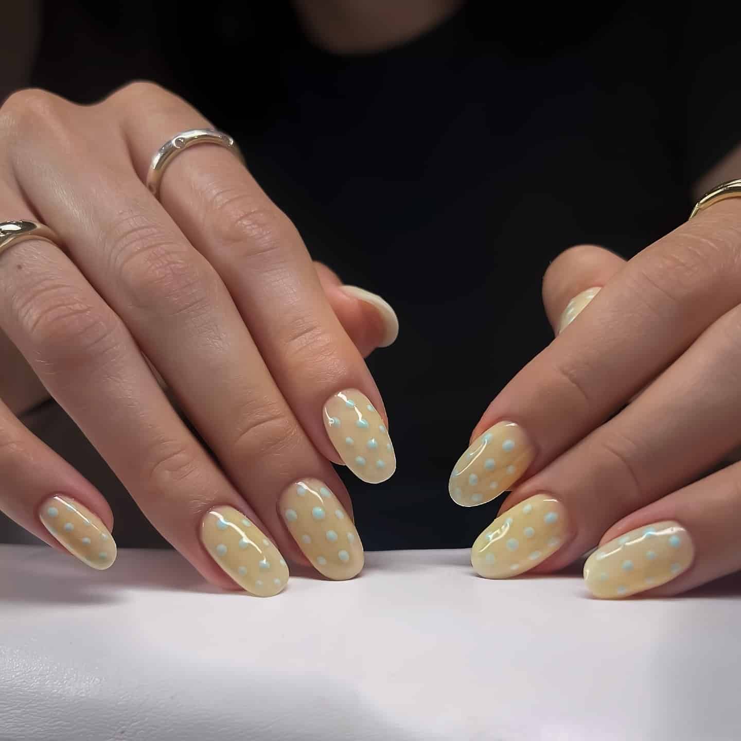 19. Pastel Yellow Polka Dot Almond Nails - pastel yellow nail ideas