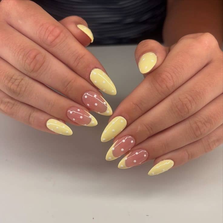 21. Pastel Yellow French Tip and Polka Dot Almond Nails - pastel yellow nail ideas