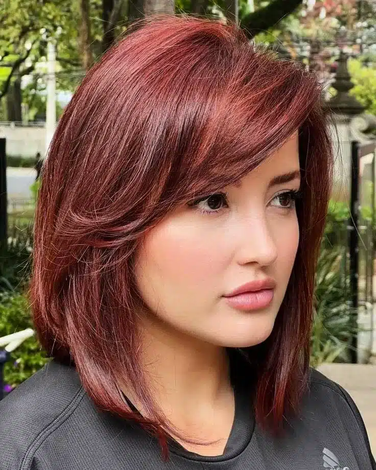 12. Feathered Auburn Red Long Bob - Long Layered Bob