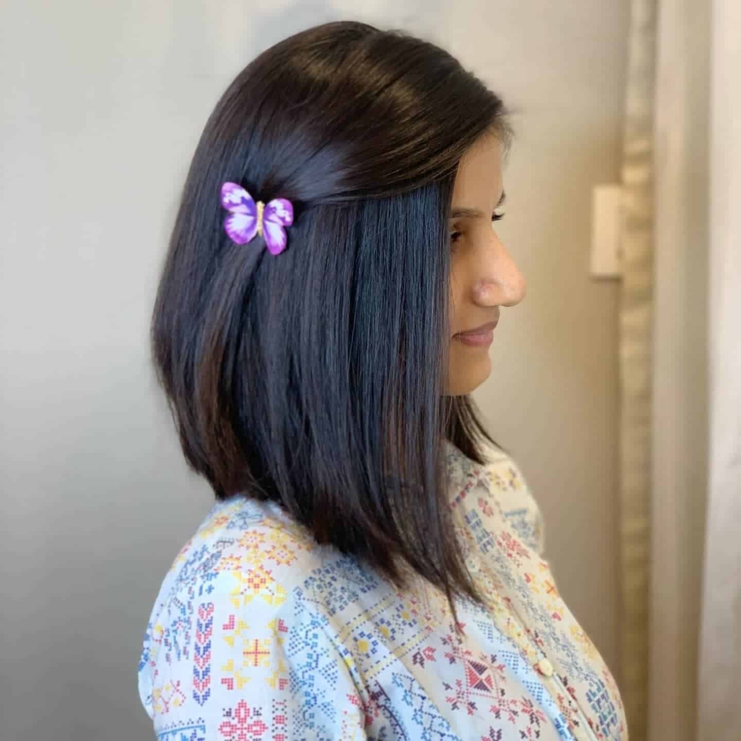 13. Sleek Classic Black Long Bob with Side Detail - Long Layered Bob