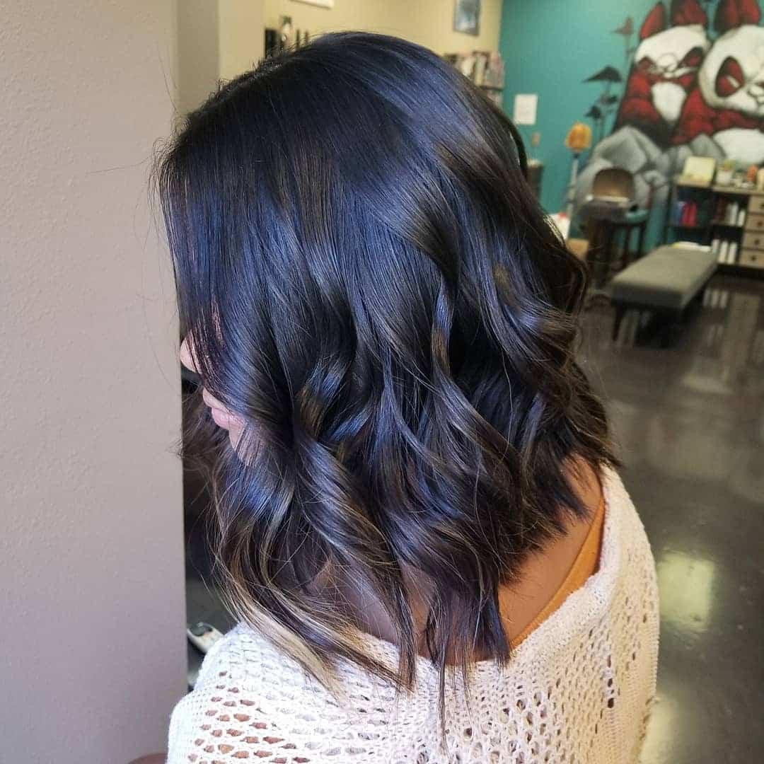 15. Glossy Midnight Black Wavy Lob - Long Layered Bob