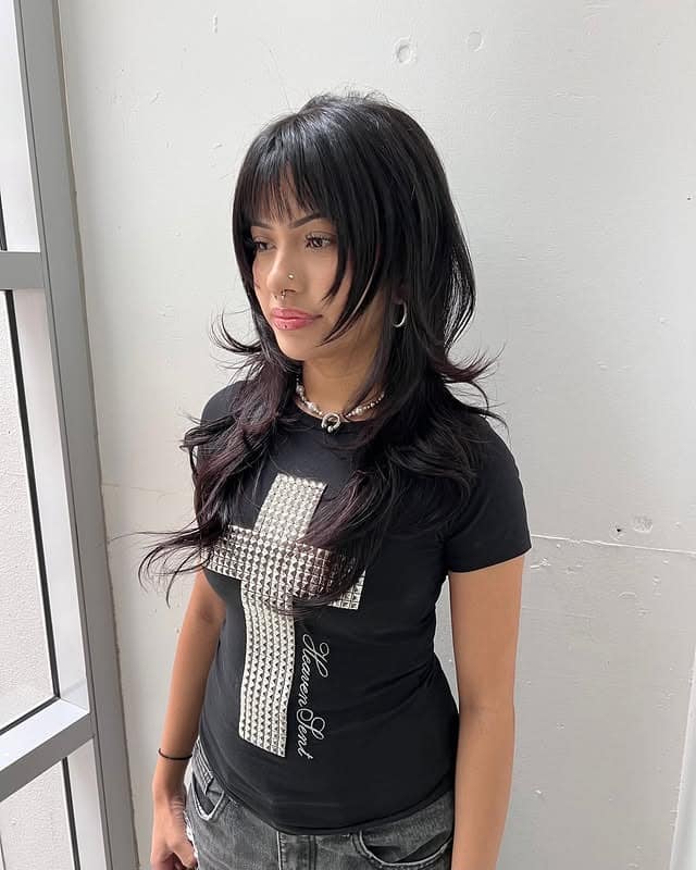 2. Long Layered Wolf Cut with Curtain Bangs in Deep Black - Wolf Haircuts With Bangs