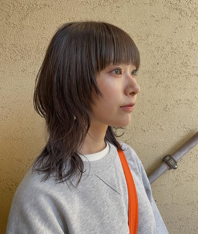 4. Medium Wolf Cut with Blunt Micro Fringe in Natural Brown - Wolf Haircuts With Bangs