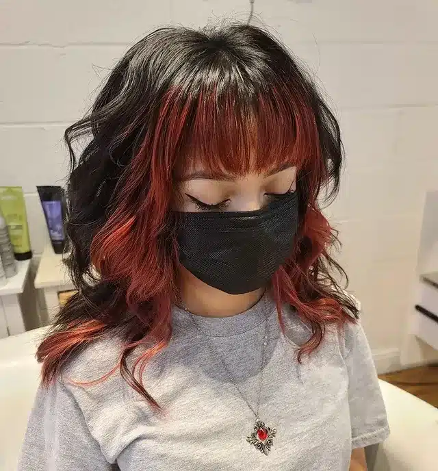 7. Voluminous Wolf Cut with Face-Framing Bangs in Honey Brown - Wolf Haircuts With Bangs