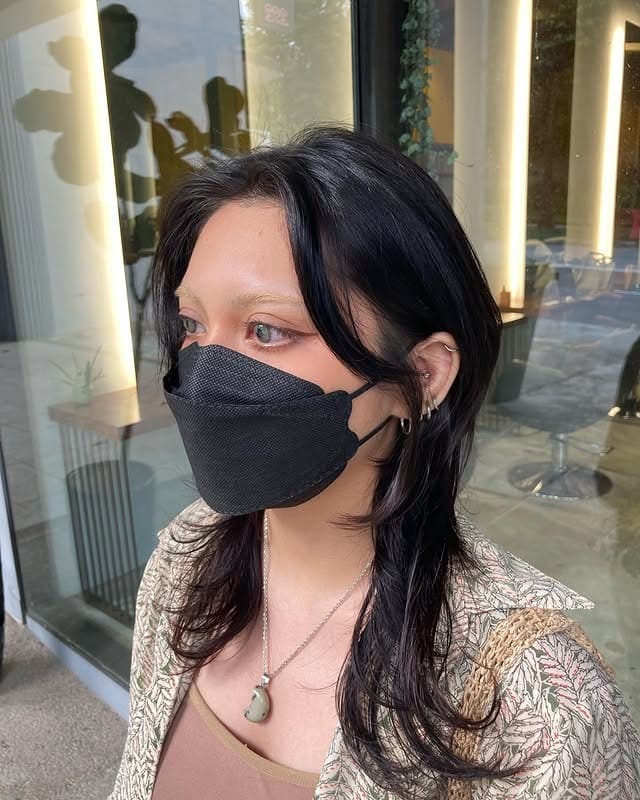 9. Layered Wolf Cut with See-Through Bangs in Jet Black - Wolf Haircuts With Bangs