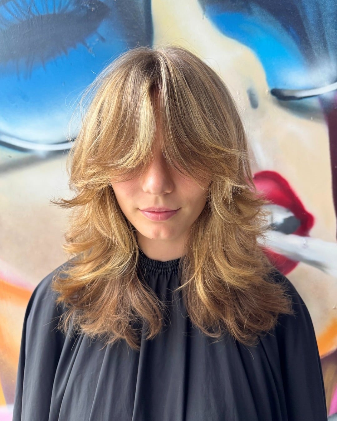 20. Feathered Wolf Cut with Heavy Curtain Fringe in Golden Blonde - Wolf Haircuts With Bangs