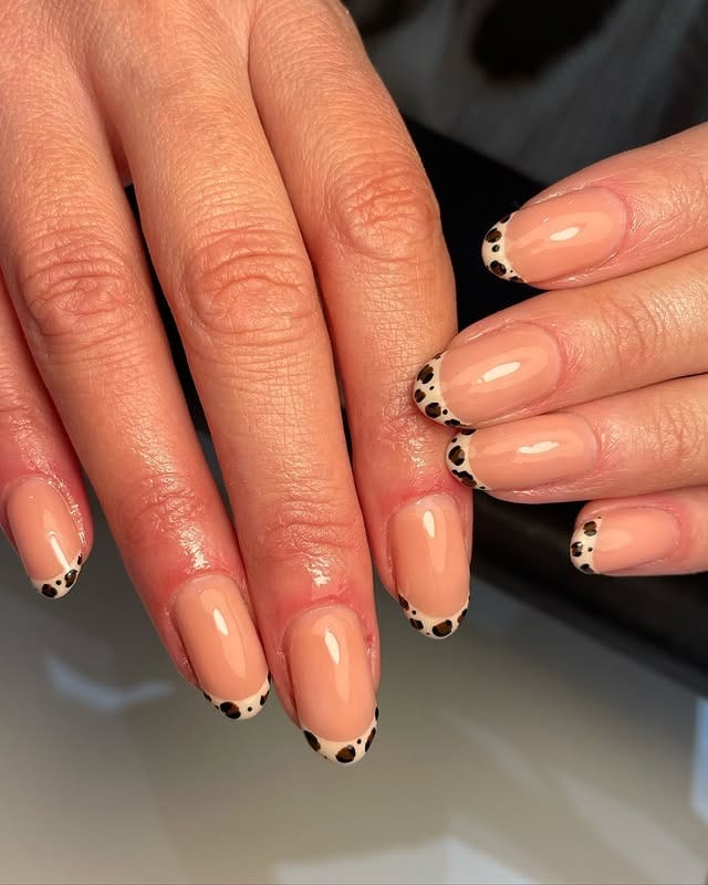 9. Nude Short Nails with Leopard Tip Detail - very short nail ideas