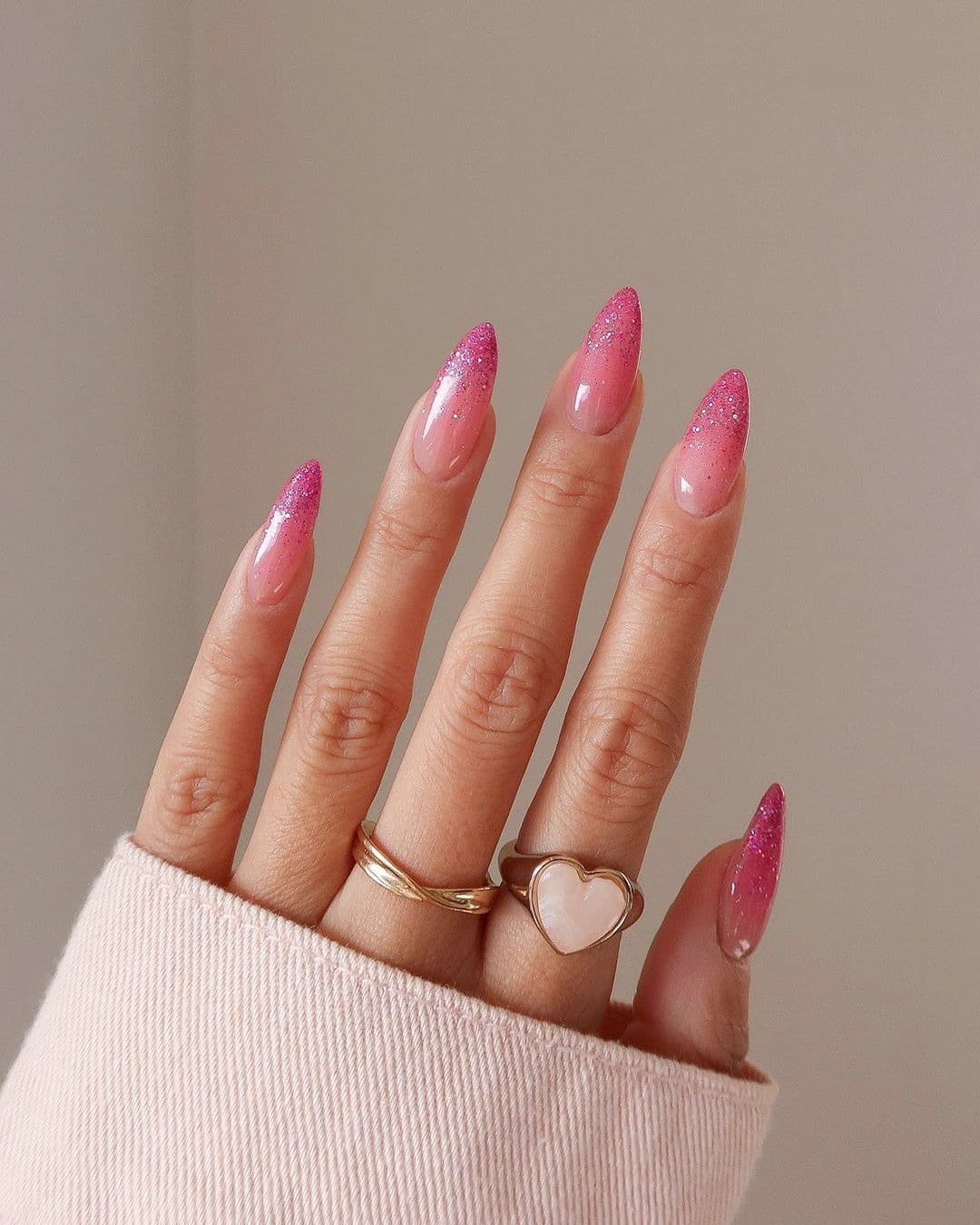 4. Pink Glitter Ombre Almond Nails - pink nail ideas