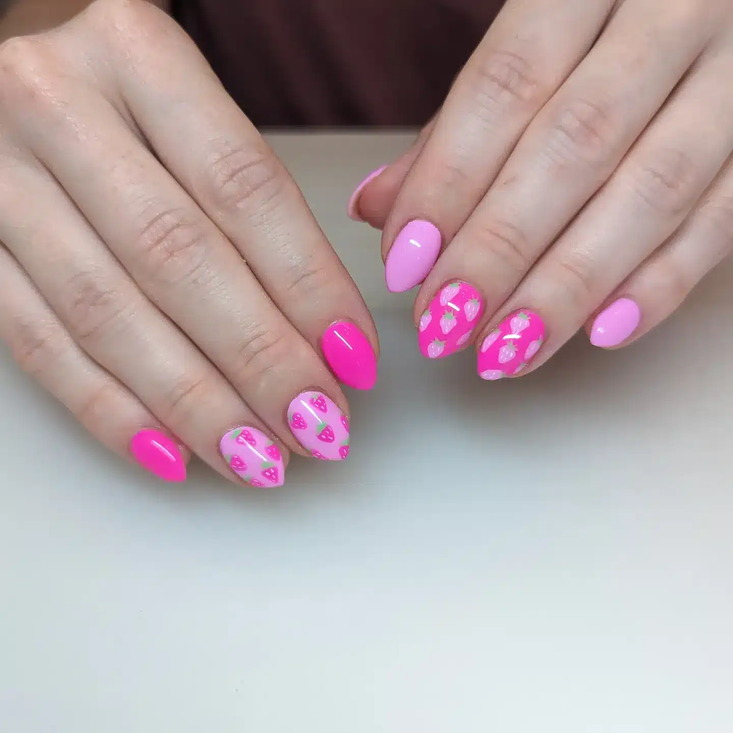 13. Pink Strawberry Accent Almond Nails - pink nail ideas