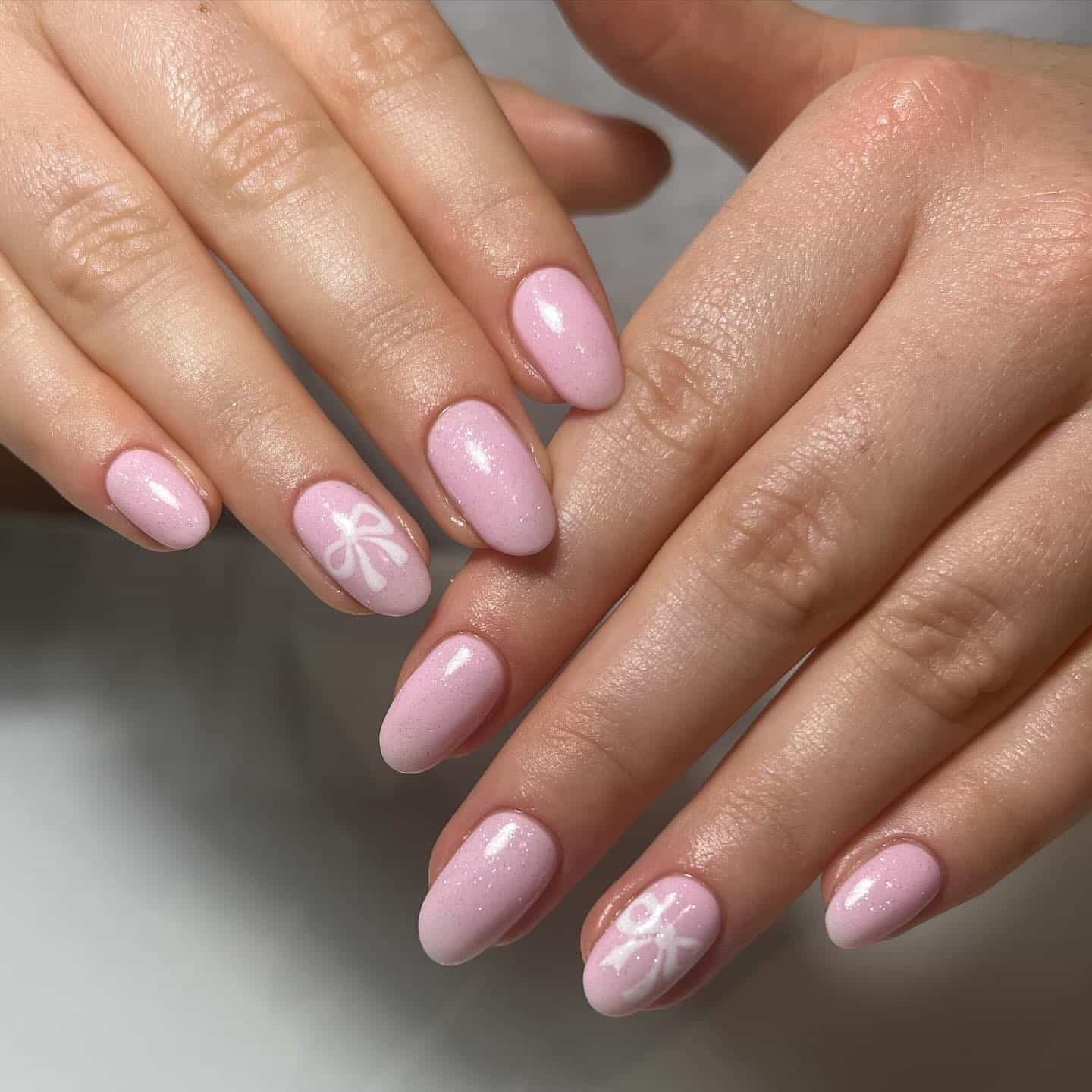 18. Soft Pink Short Nails with Minimal White Florals - pink nail ideas
